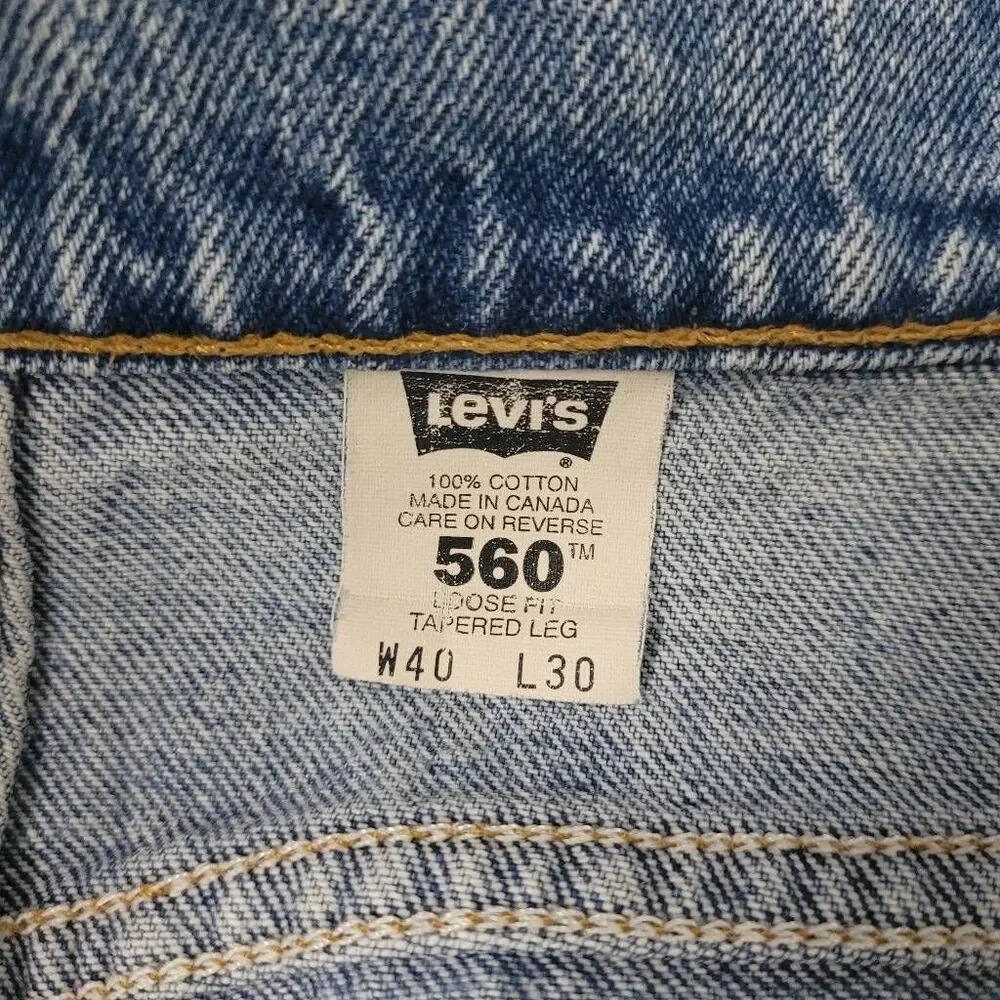 Vintage 90s Levi's 560 Loose Fit Tapered‎ Leg Denim Jeans Sz 38x28.5 Light Wash